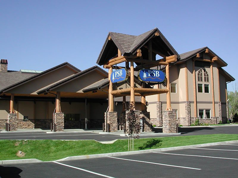 Wide angle view of natural log exterior of Panhandle State Bank in Coeur d'Alene