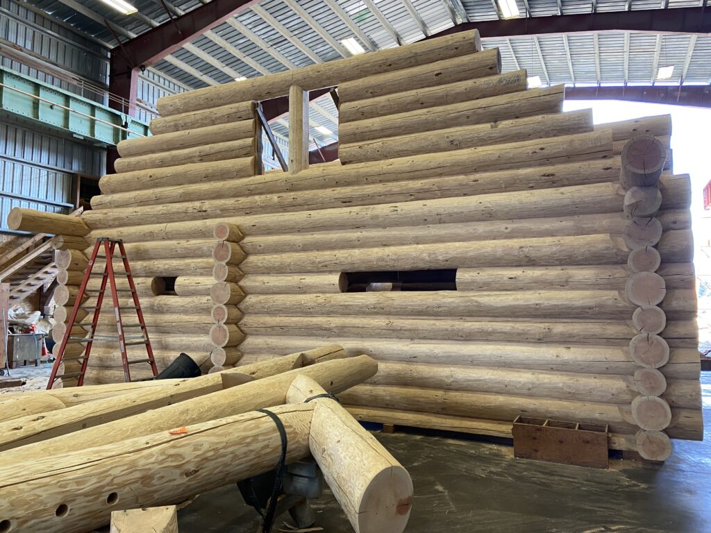 Image of a handcrafted log home under construction