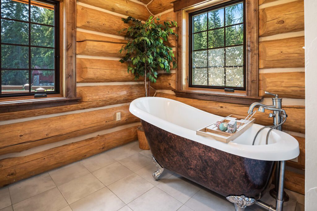 claw foot tub in log cabin bathroom