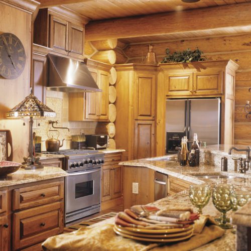 Luxury log kitchen at its finest! This custom kitchen is any chef's dream.