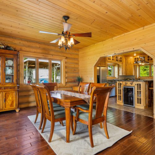 Simple yet cozy - this log home dining room is just right for any family.