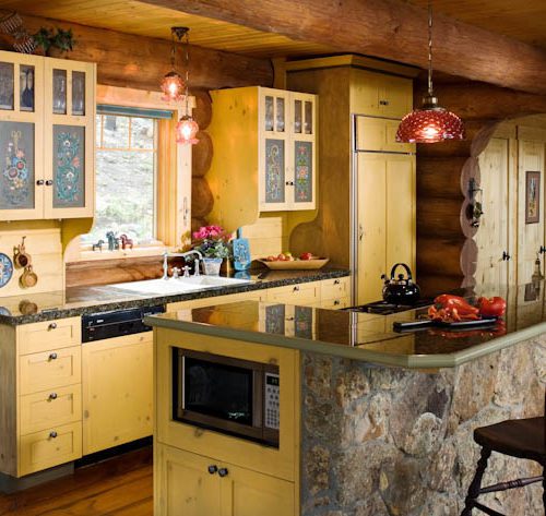 Lovely yellow cabinets give this kitchen a cozy homely feel.