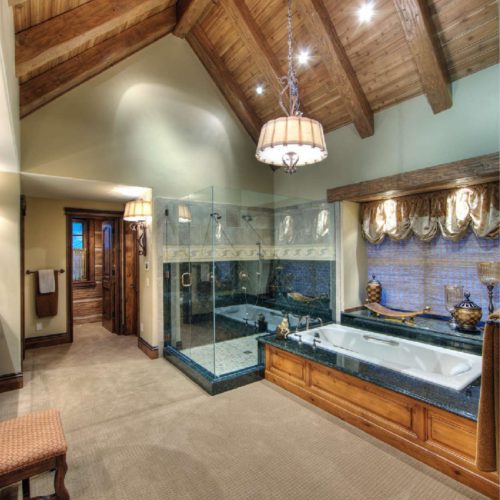 This luxury bathroom is fitting for this stunning timber frame home.