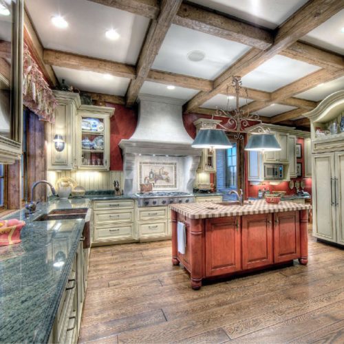 Always a crowd pleaser, this timber frame home has a kitchen that is more drool worthy than the food made in it.
