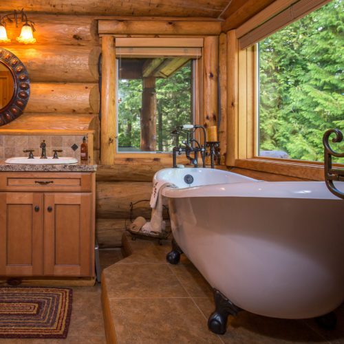 Imagine soaking in this claw foot tub with nature views!